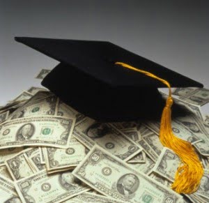graduation student hat on money